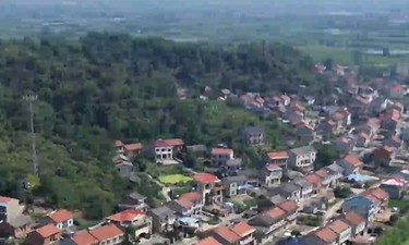 跟着总书记看中国｜峒山村的“金山银山”