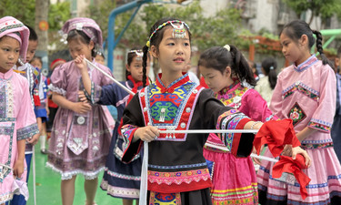 师生携手共赴民俗之约，南宁市青秀区长堽小学开展“三月三”系列活动