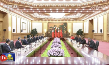 习近平会见汤加国王图普六世
